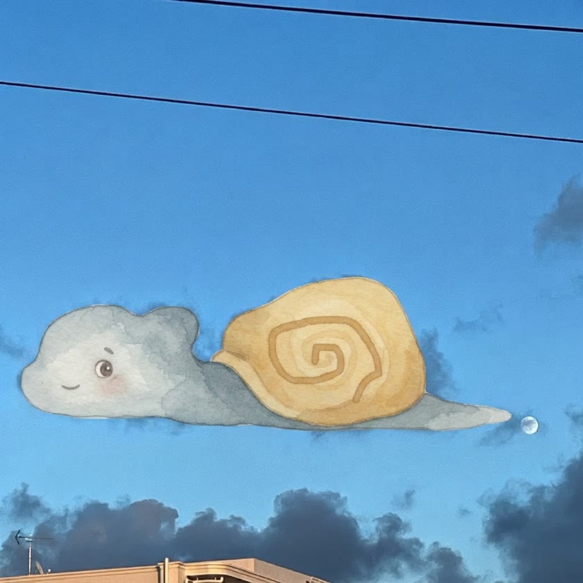 夕暮れの空の雲がカタツムリになった作品